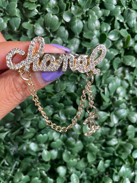 Chanel cursive brooch hotsell